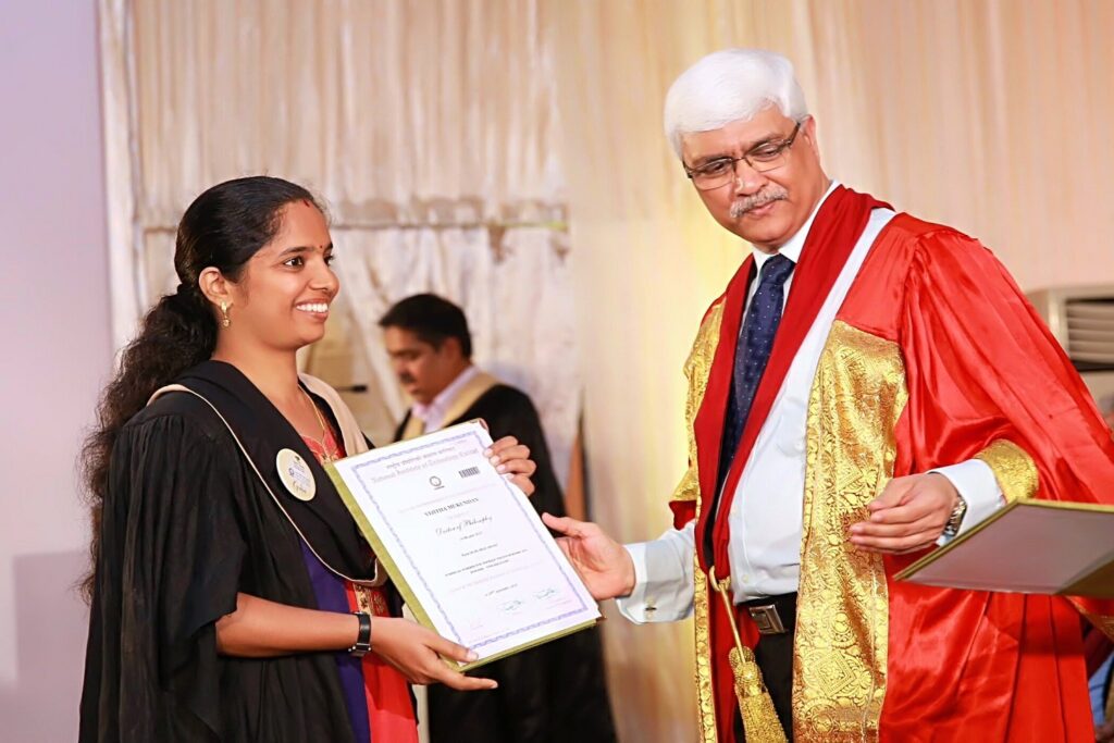 Ms. Vijitha Mukundan being awarded with Phd